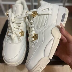 Jordan 4 metallic gold.